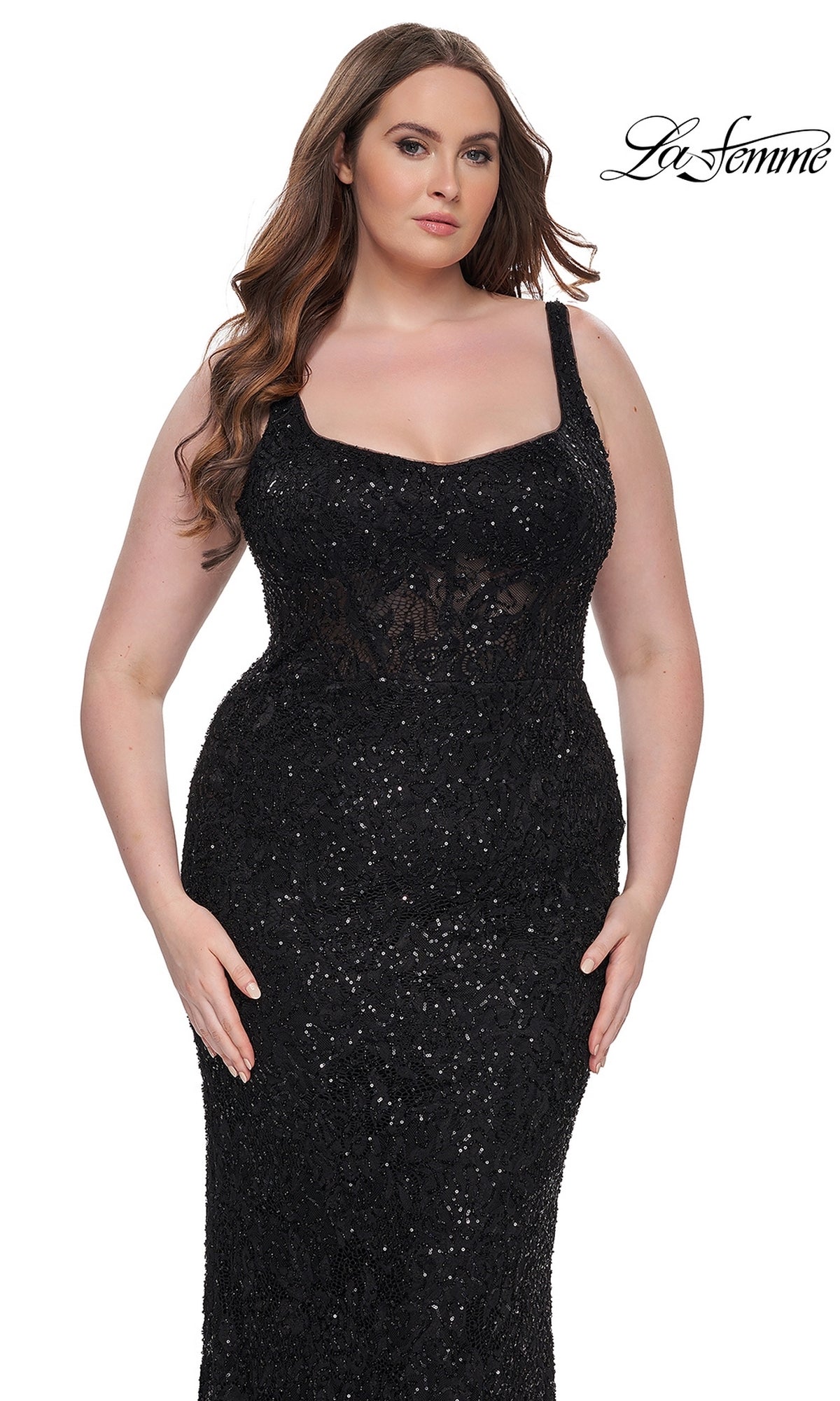 A woman models the Plus-Size Lace Prom Dress: La Femme 31535—a fitted, sleeveless long formal gown with a square neckline—in black, posing against a white background. The